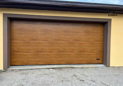 ЗБК Гаражні ворота 3000x2200 Золотий Дуб 3425870 фото